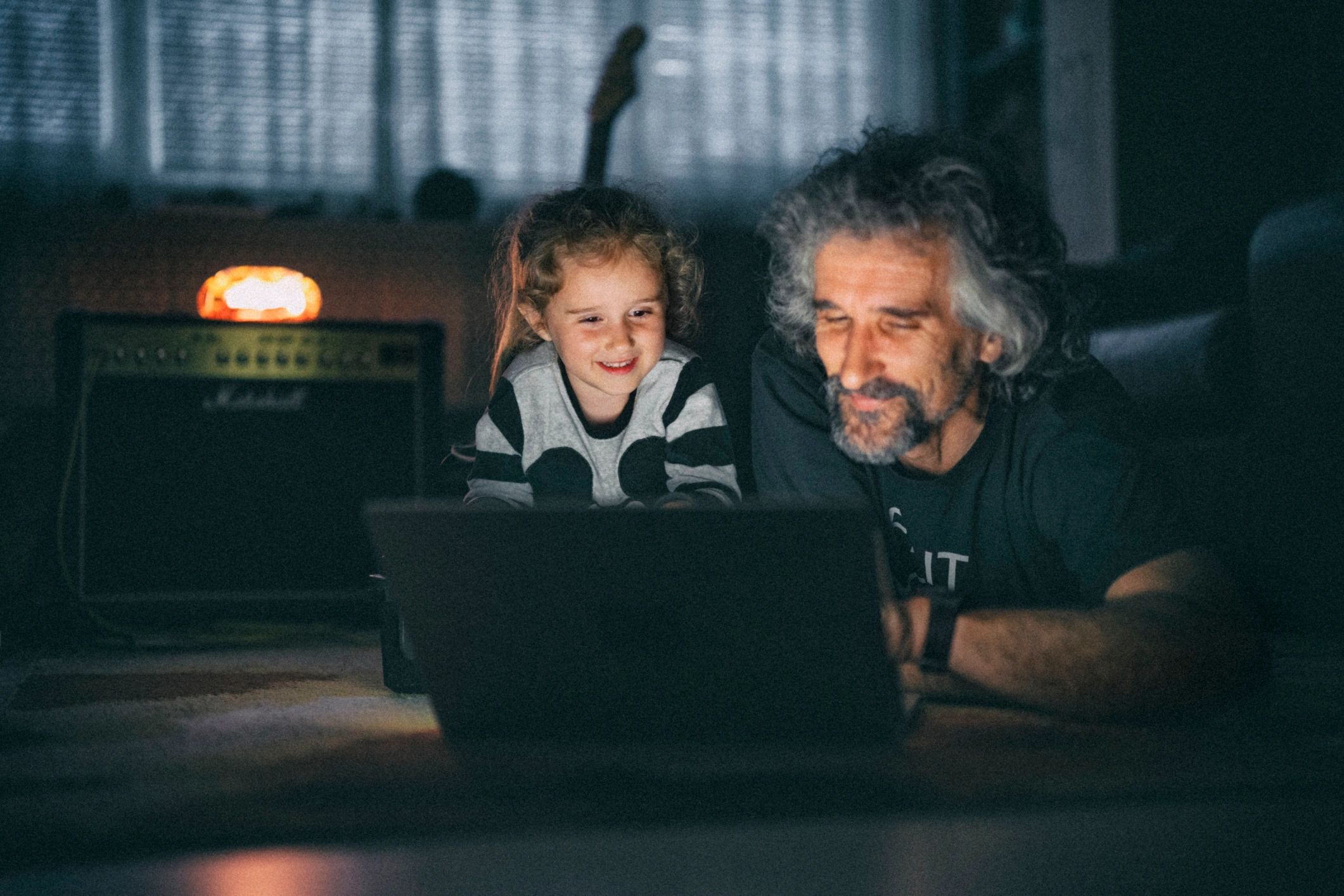 Parent and child learning together at home